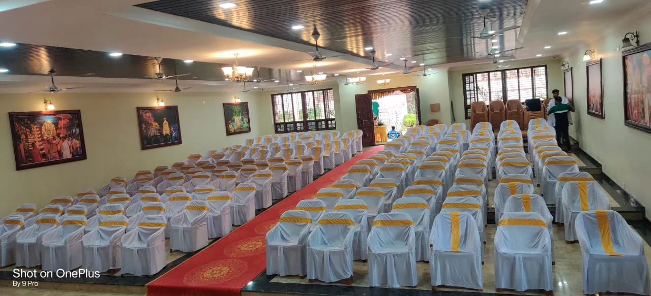 Seating arrangement with chair covers at Parijatha Conventional Hall